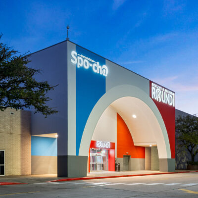 Exterior entrance to Round1 Willowbrook at dusk.